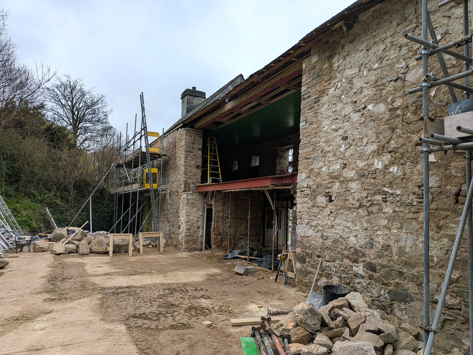 stone building with scaffolding